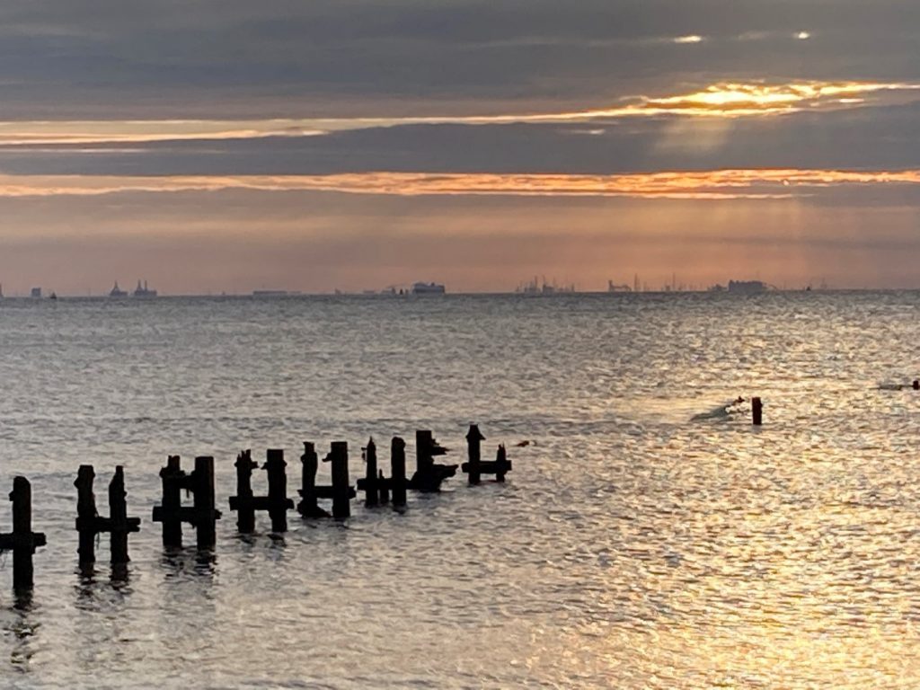 A view from Spurn Point towards the south bank of the Humber showing remnants of a pier