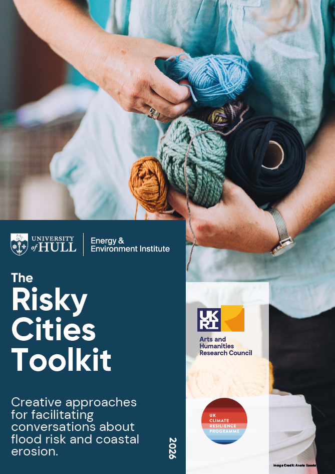 The front cover of the Risky Cities Toolkit. Shows a pair of hands holding a bundle of wool.